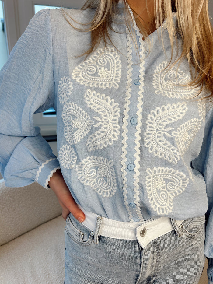 Soft blue blouse