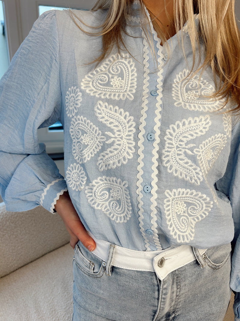 Soft blue blouse