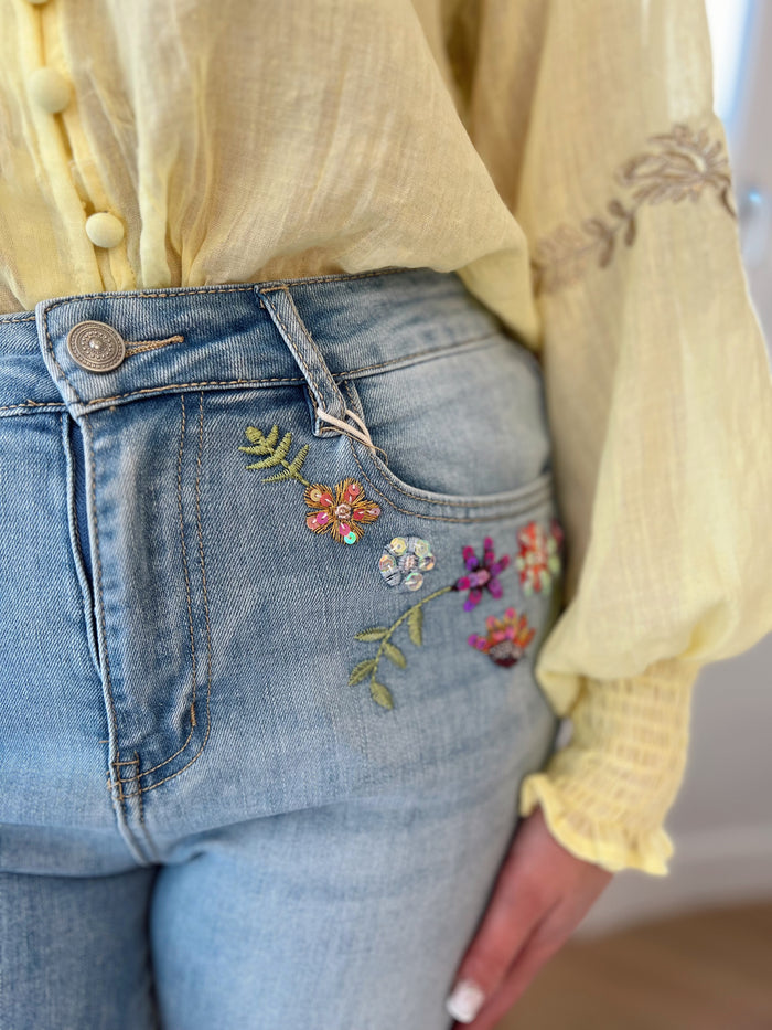Floral stitch denim